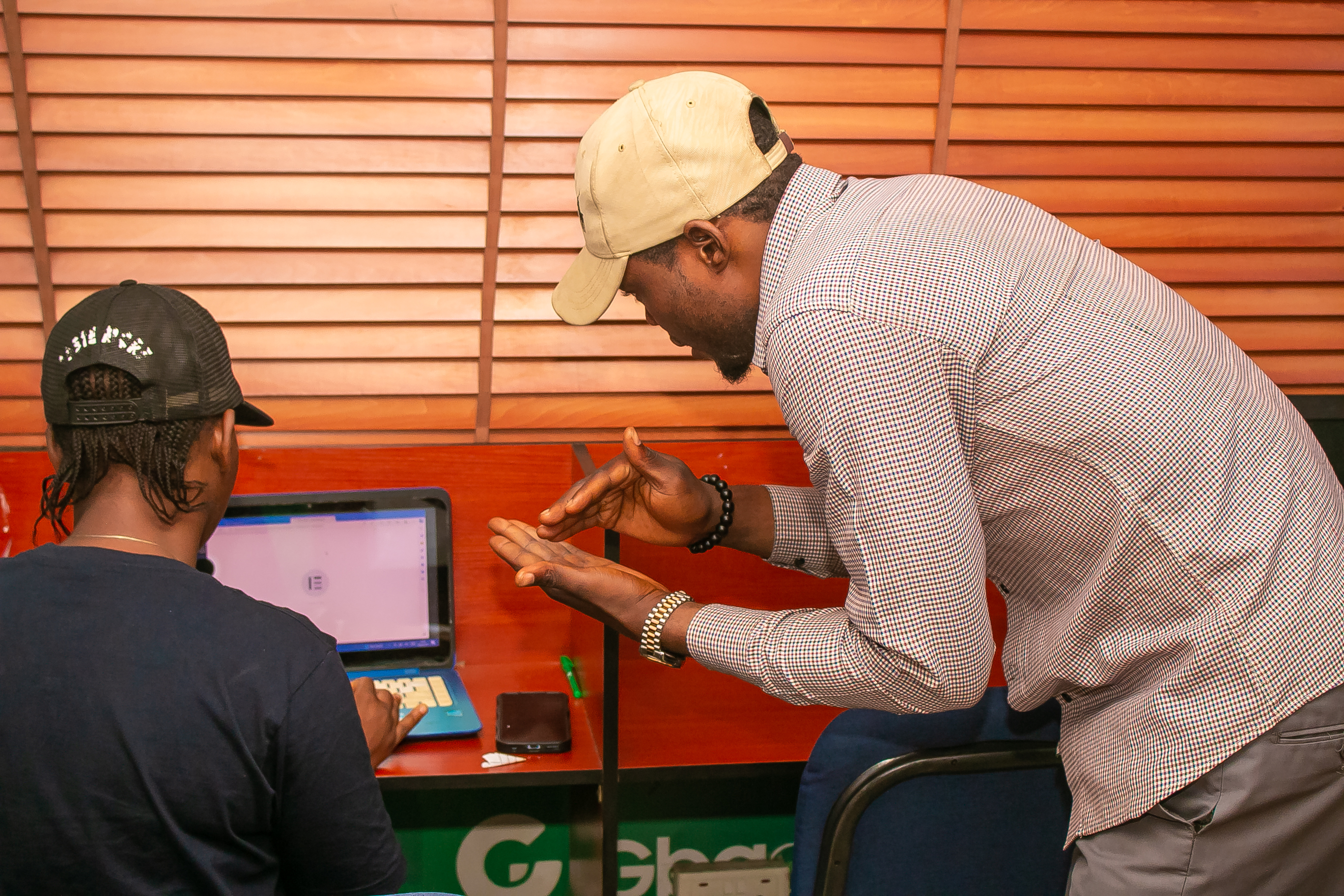 Instructor helping students